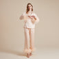 Feather-trimmed pajama set with crystal diamond buttons